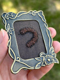 Upcycled Framed Embroidery: Millipede!